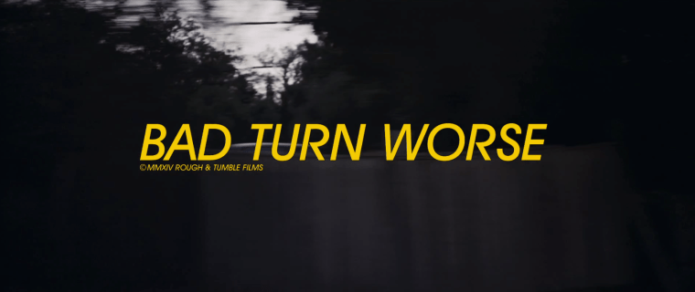 27 title card comes up over driving shot copy 2