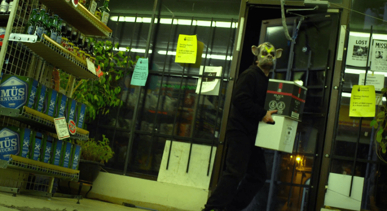 Note the cases of Mus Knuckle beer on frame left.