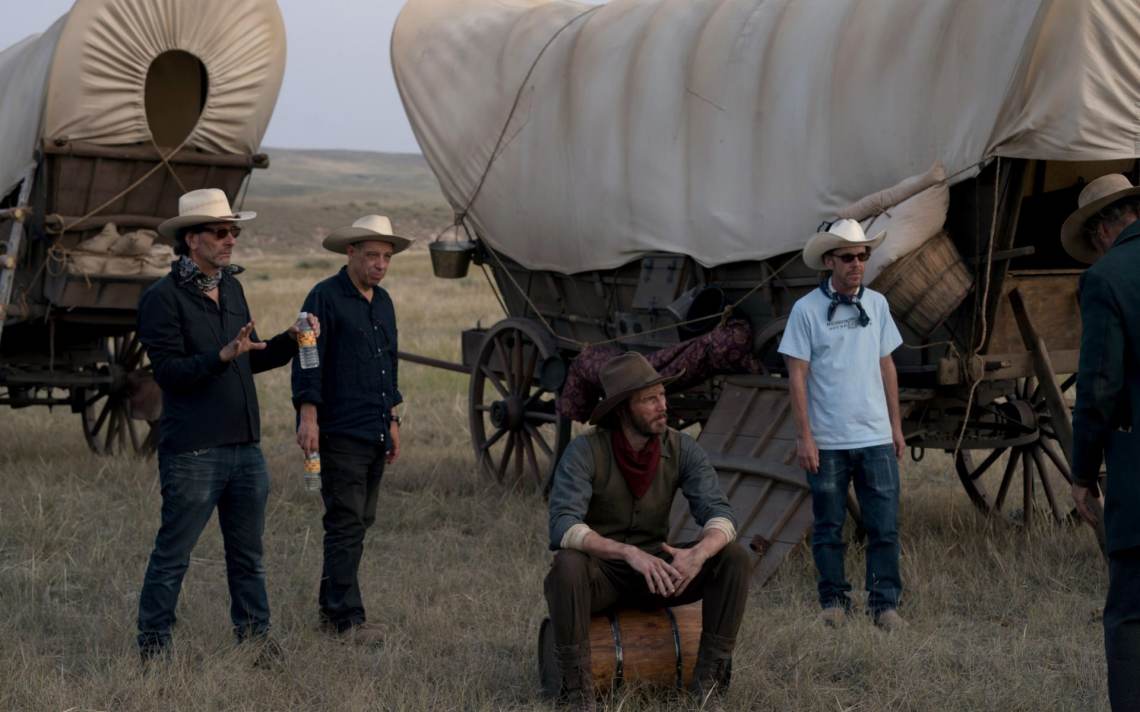 The Coen Brothers and cinematographer Bruno Delbonnel on the set of The Ballad of Buster Scruggs.