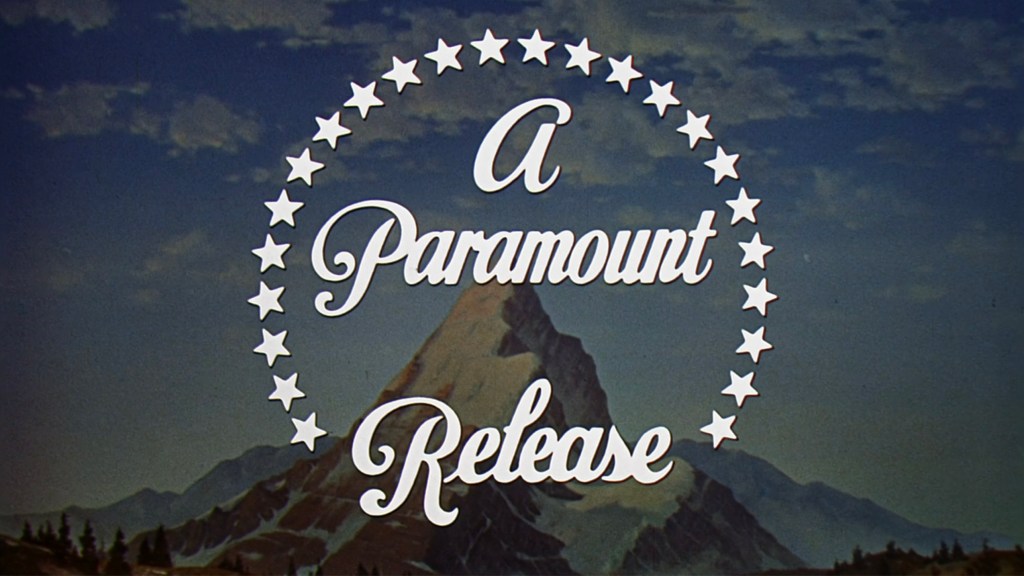 Logo of Paramount Pictures with the text 'A Paramount Release' surrounded by stars and mountains background.
