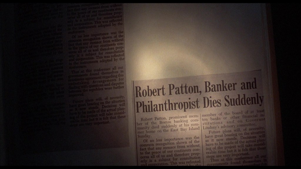 A newspaper clipping announcing the sudden death of Robert Patton, a banker and philanthropist. The headline reads 'Robert Patton, Banker and Philanthropist Dies Suddenly,' with details about his prominence and involvement in the Boston banking community.
