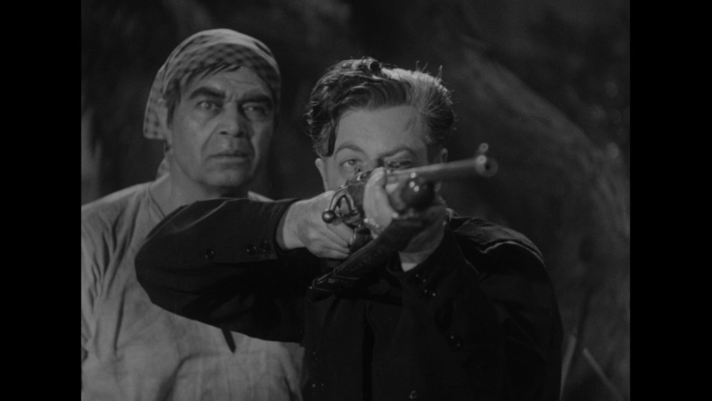 A tense scene featuring a man aiming a rifle while another man looks on apprehensively in a black and white setting.